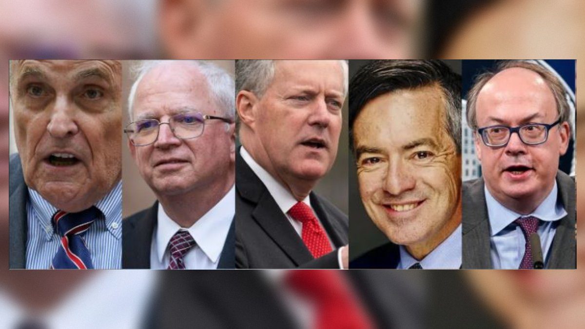 Group of five political figures engaged in discussion, showcasing a range of expressions and attire, highlighting their roles in recent events.