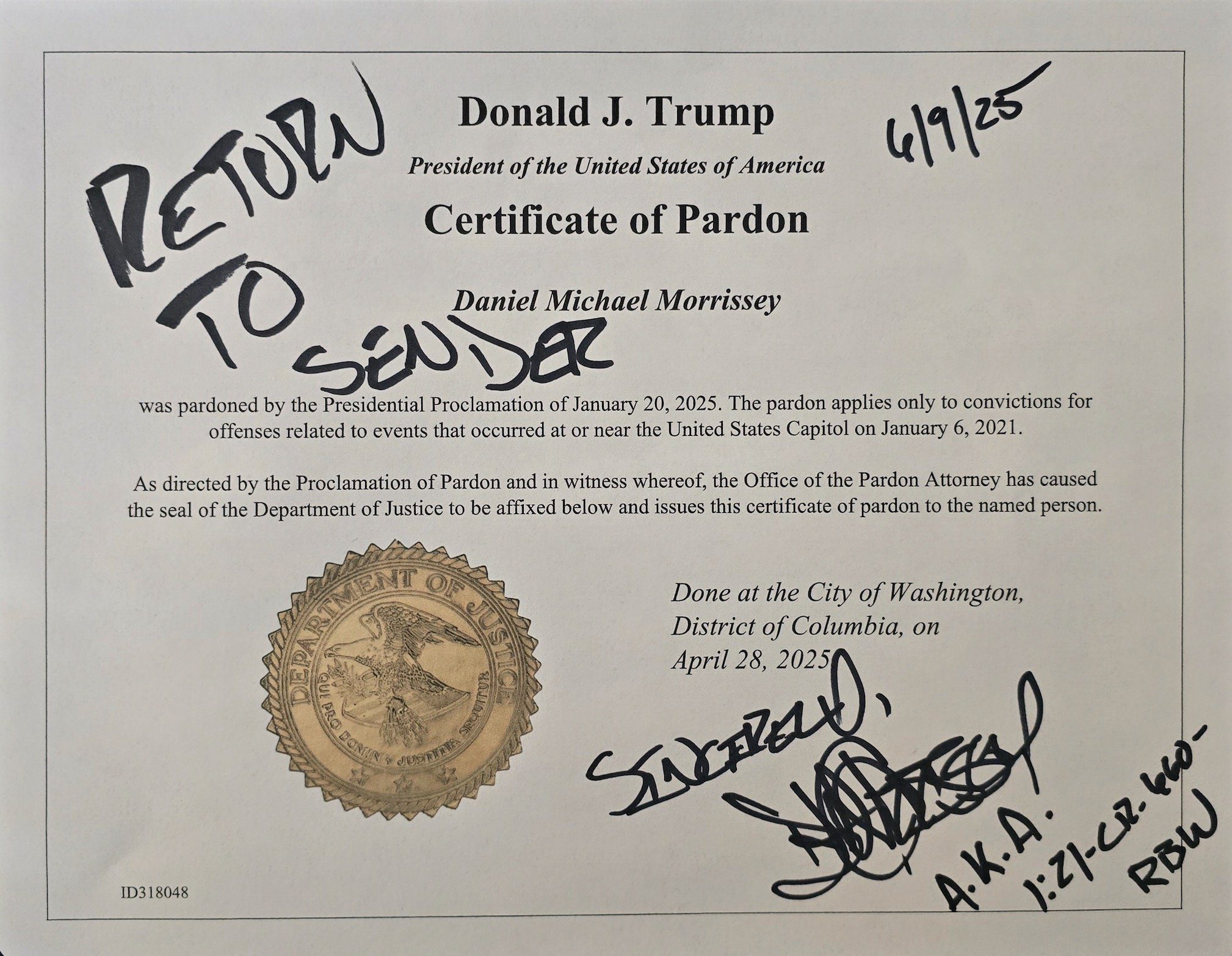 Certificate of pardon issued by Donald J. Trump for Daniel Michael Morrissey, dated April 28, 2025, with handwritten notes and Department of Justice seal.